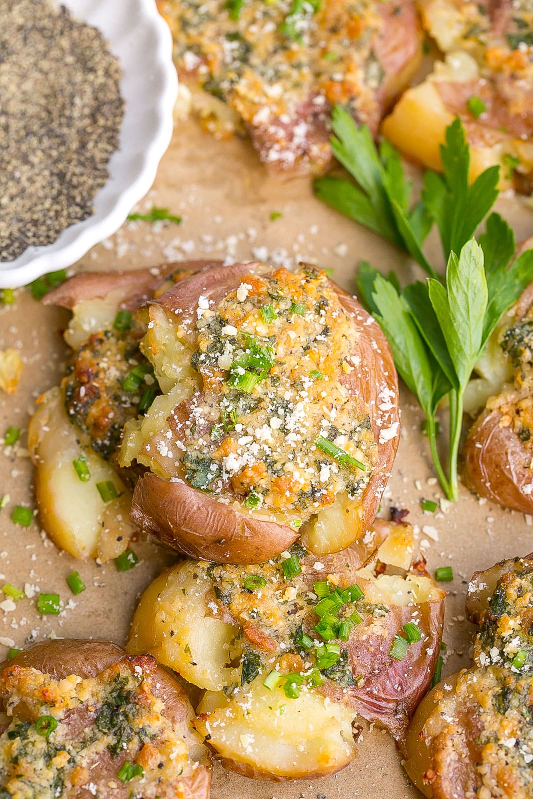 Garlic Parmesan Smashed Potatoes on baking dish.