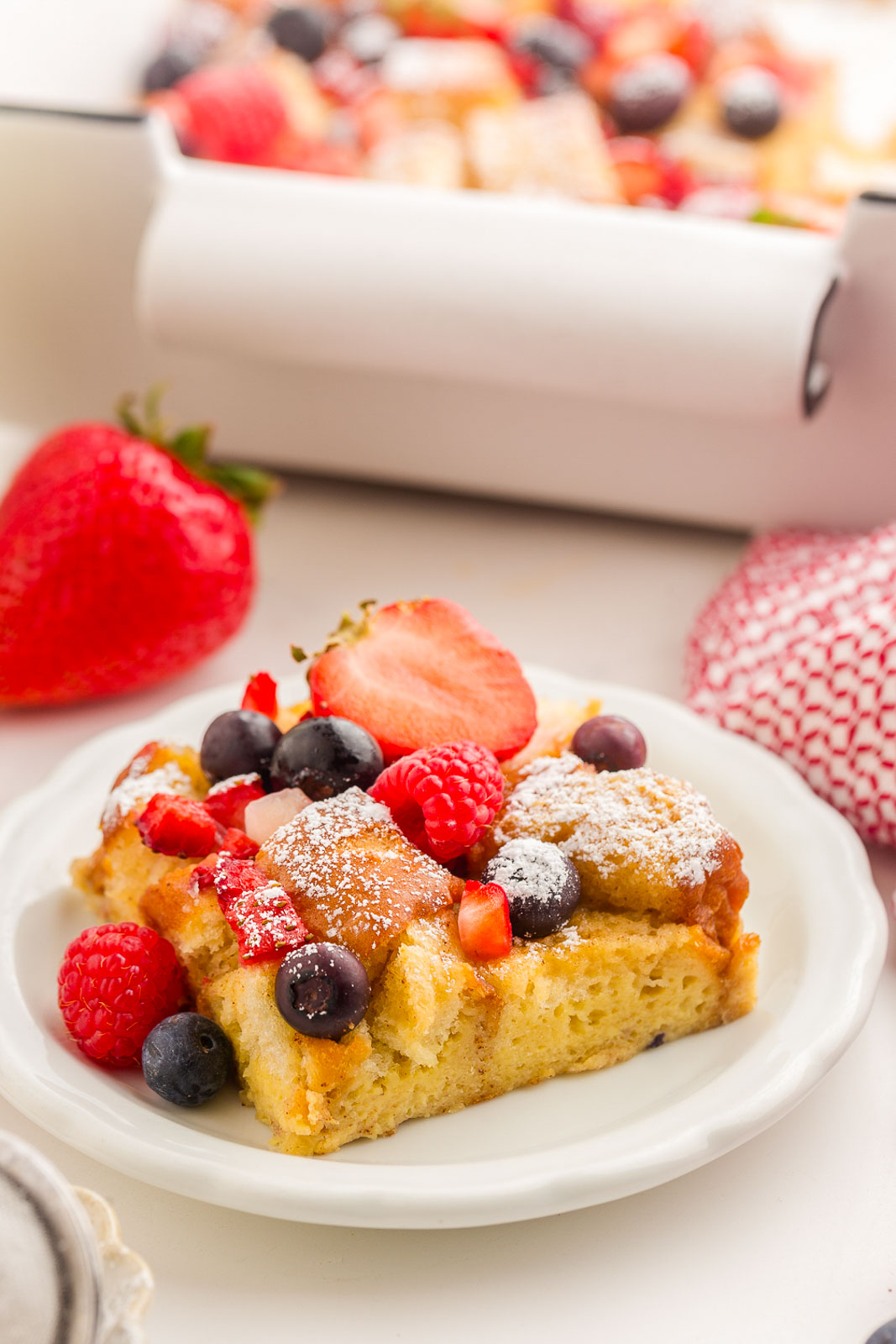 A serving of Hawaiian Roll French Toast Bake on plate.