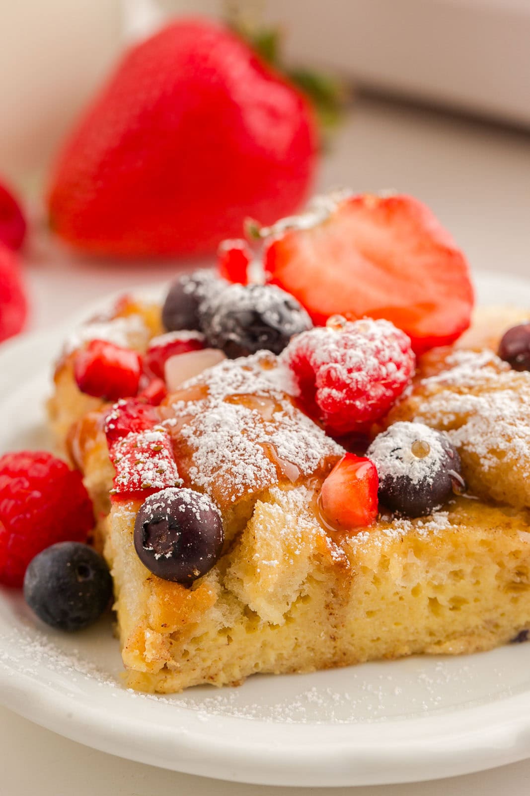 French toast with berries on top.