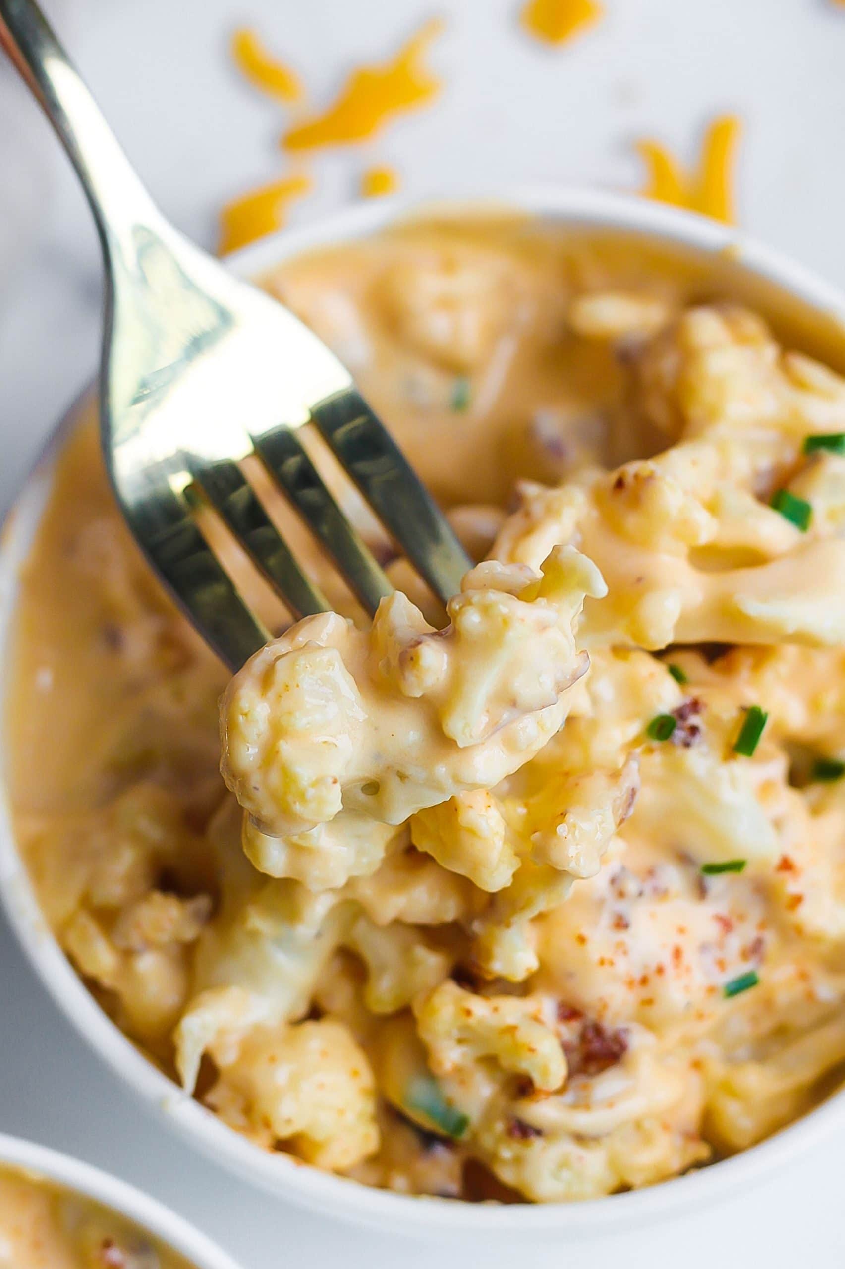 fork with cheesy cauliflower Mac and cheese