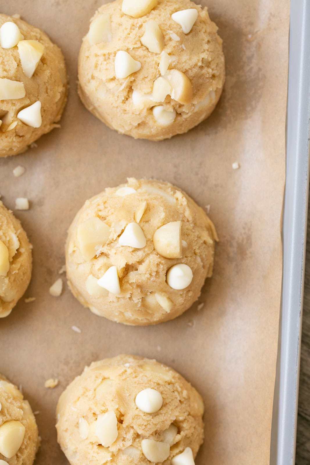 Cookie dough balls with white chocolate and macadamia nuts. 