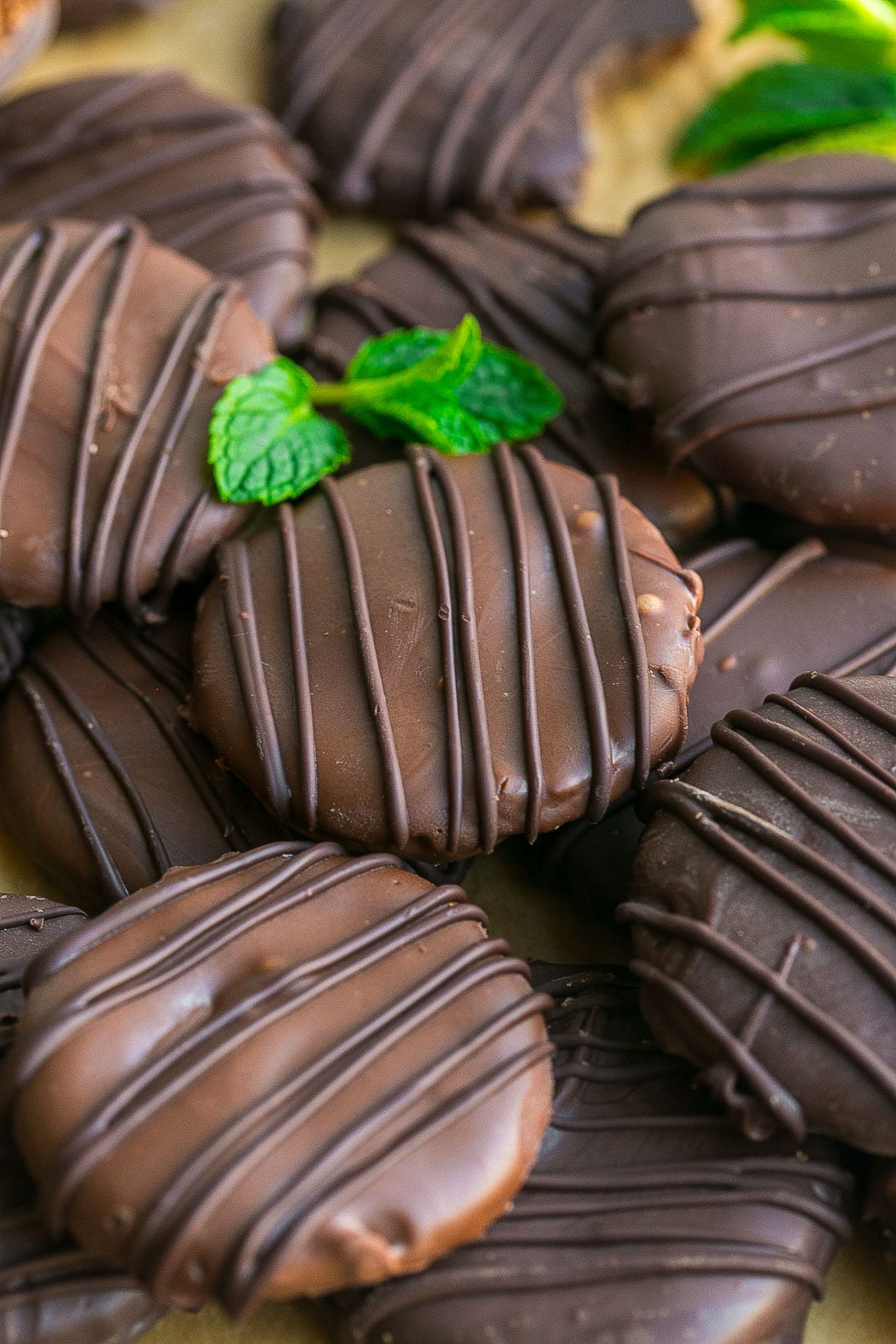 Healthy Thin Mints with chocolate drizzle on top.