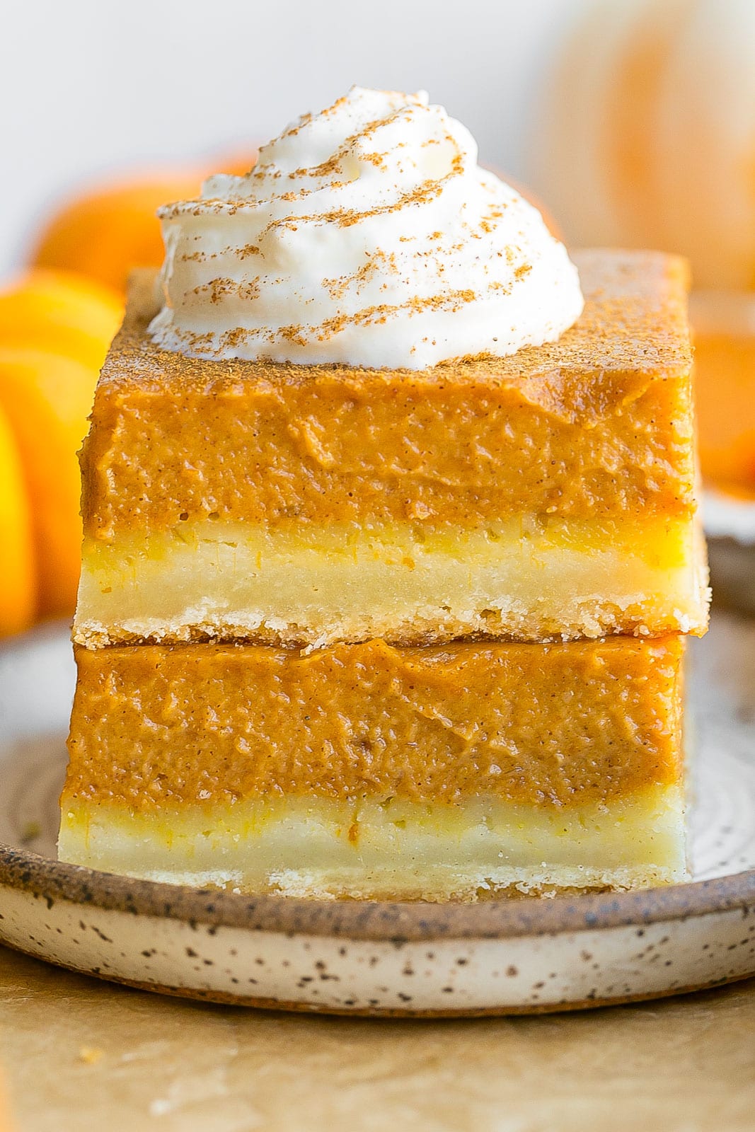 Stack of pumpkin shortbread bars.