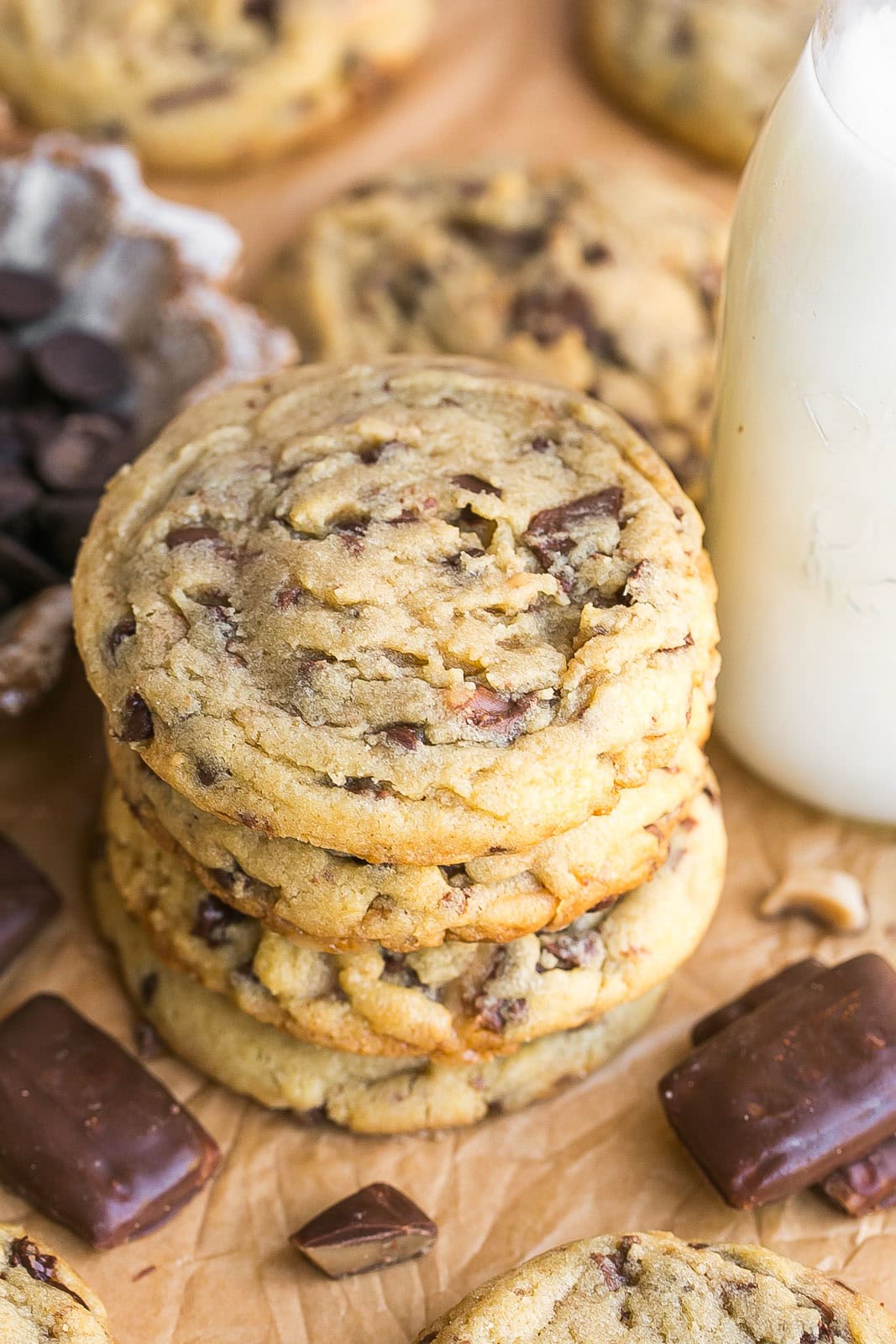 Tall stack of Toffee Cookies with chocolate chips.