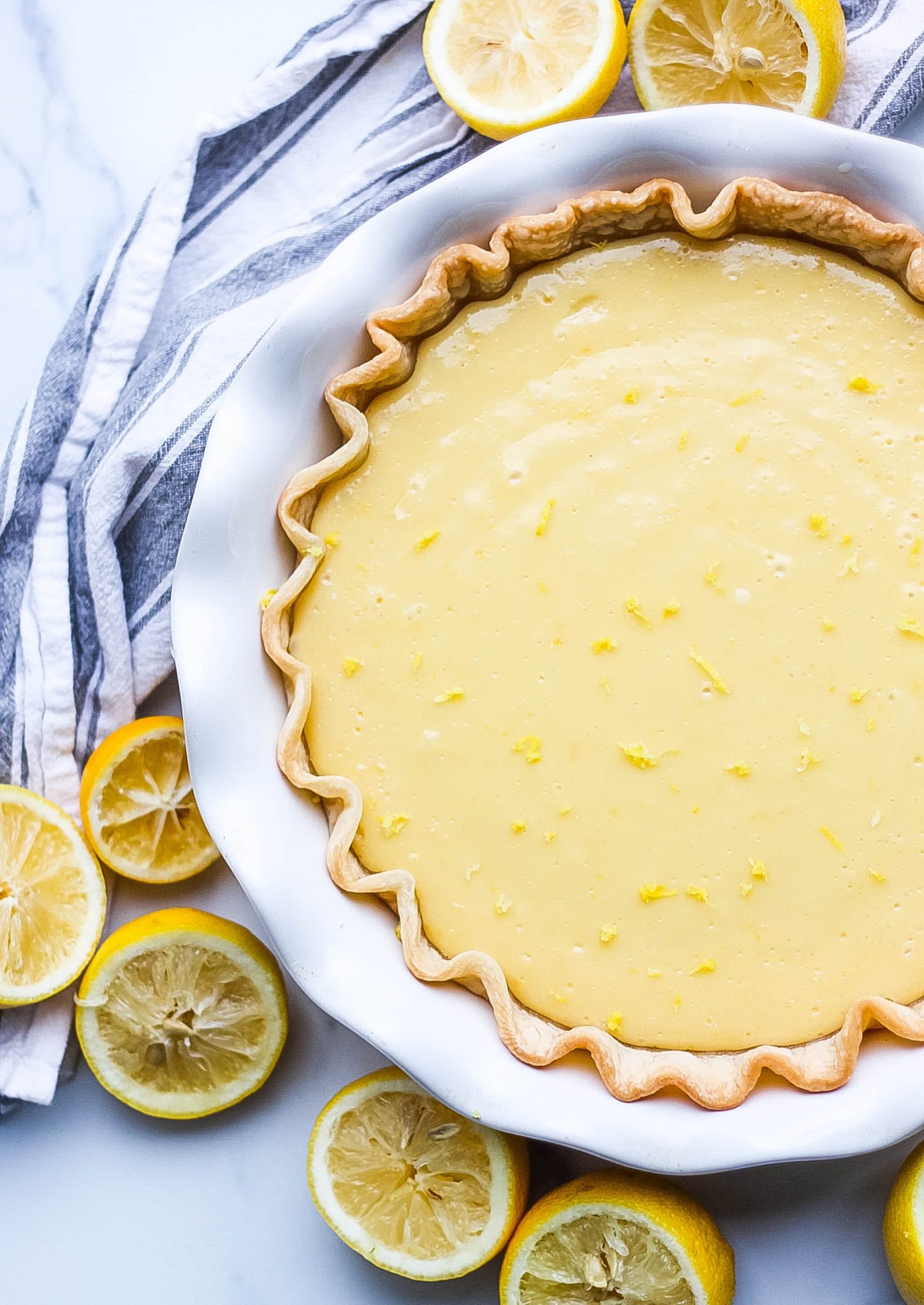 whole baked pie with lemons