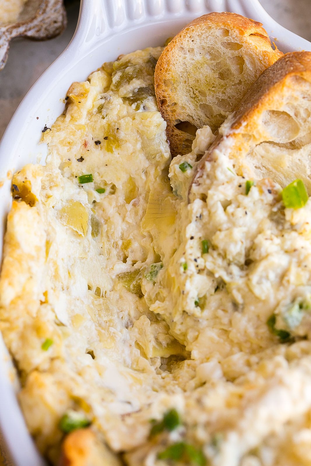 Spicy Artichoke dip with crostini.