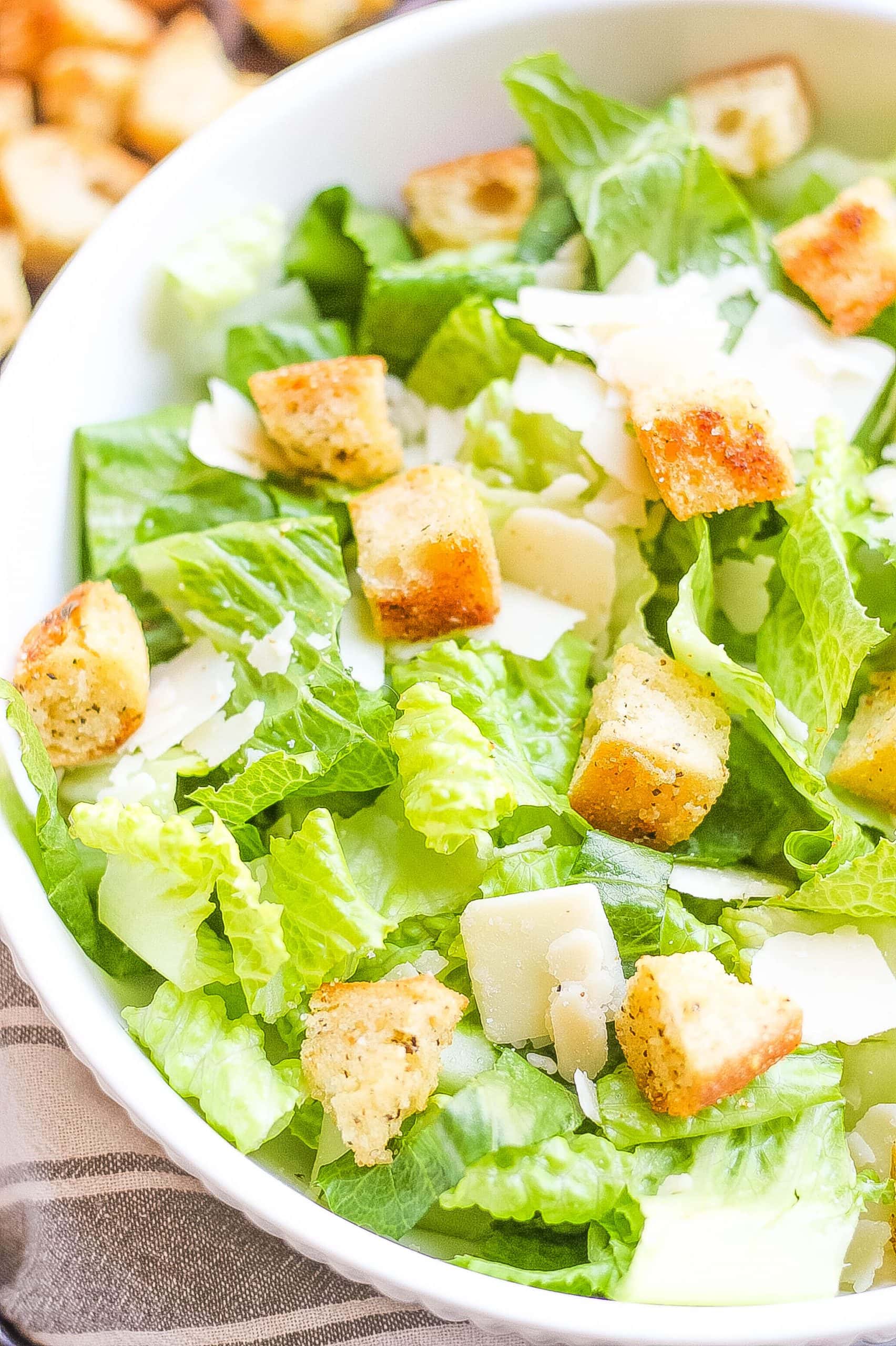 homemade crispy croutons with salad in bowl