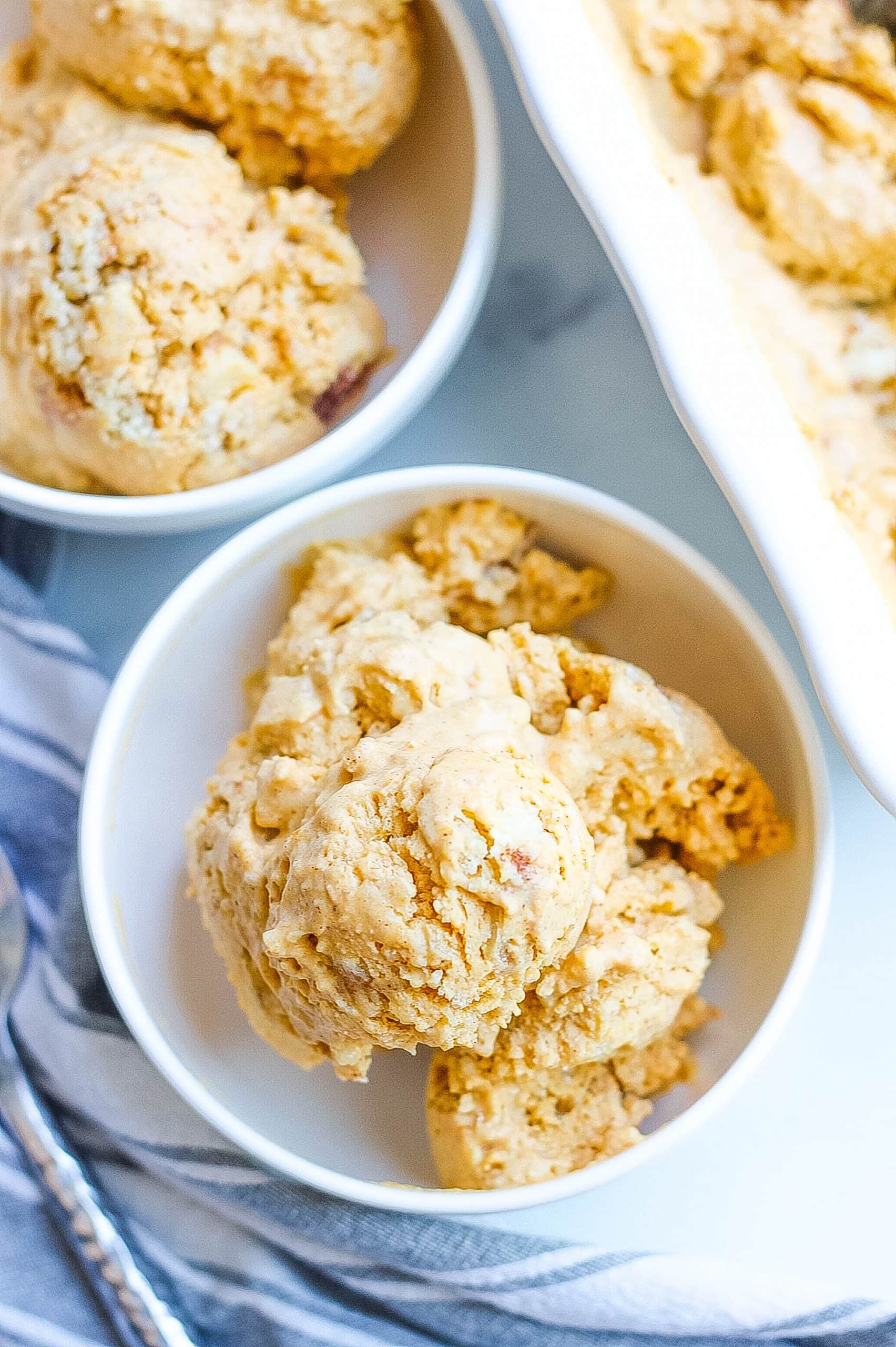 one bowl of pumpkin pie ice cream with cinnamon crumbles