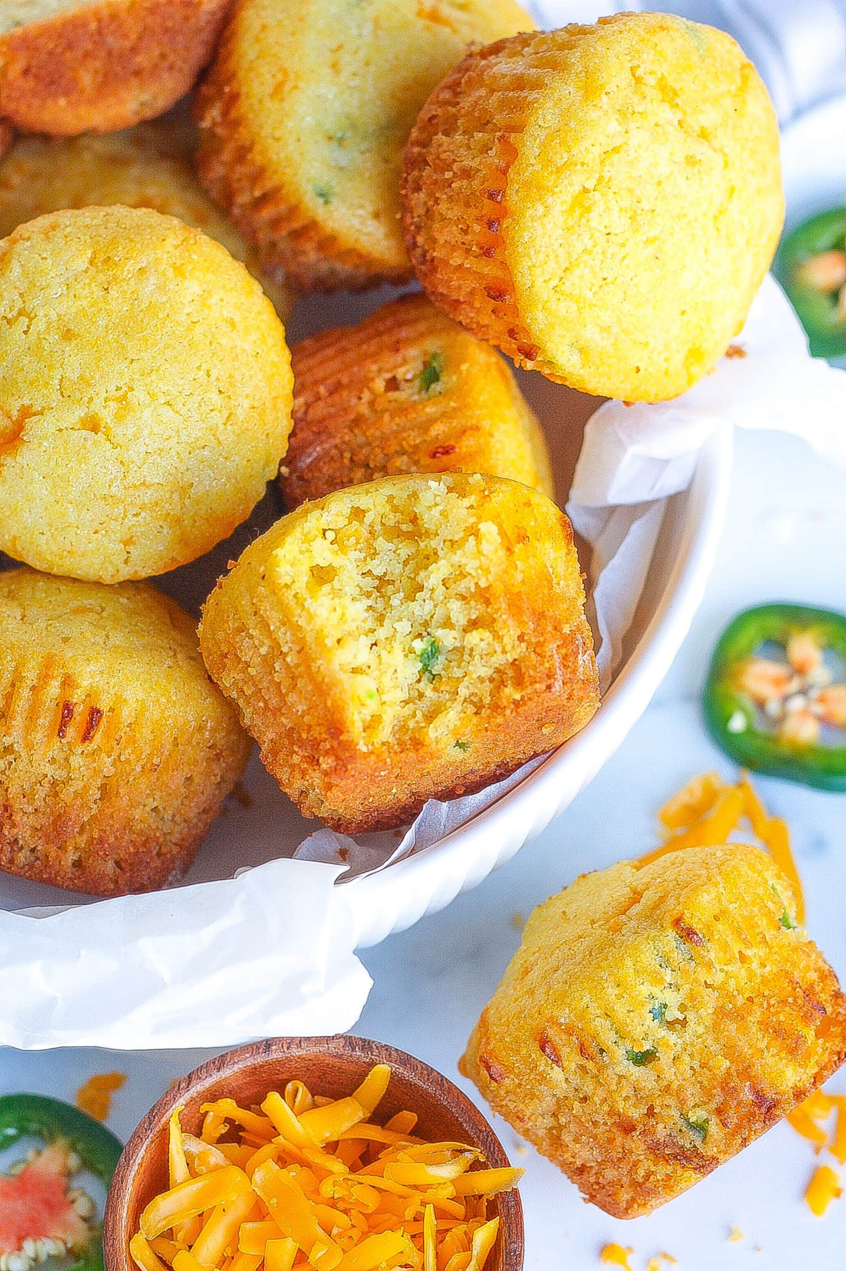 bowl of jalapeño cornbread muffins with cheddar cheese 