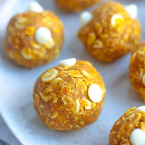 close image of pumpkin energy bites with white chocolate