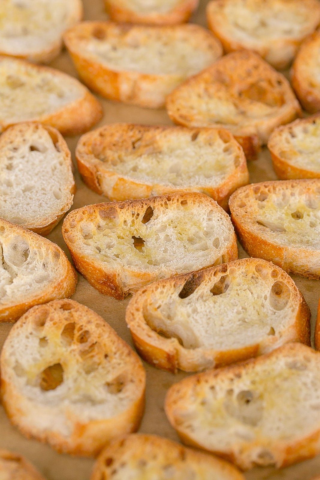 Crositini on a baking sheet.