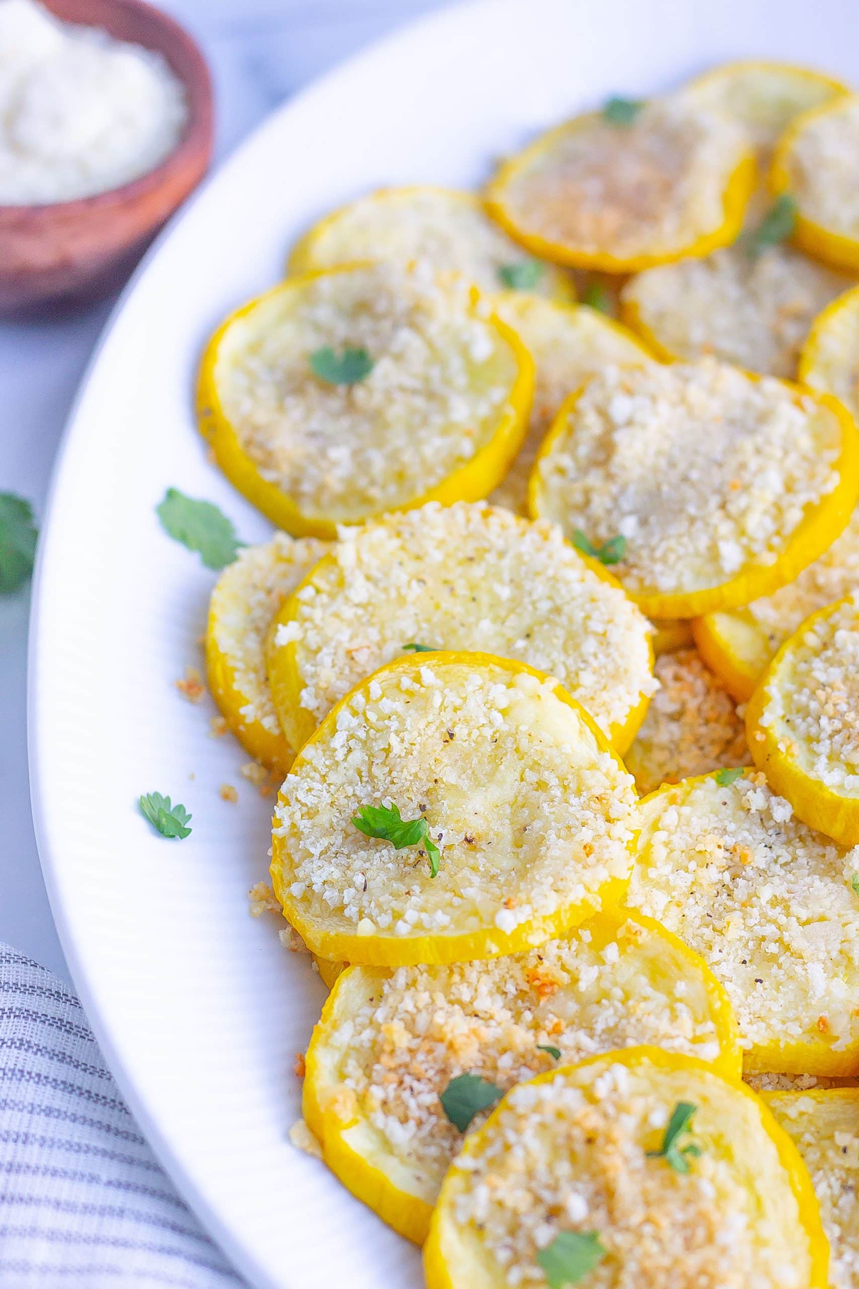 sliced yellow squash with parmesan topping