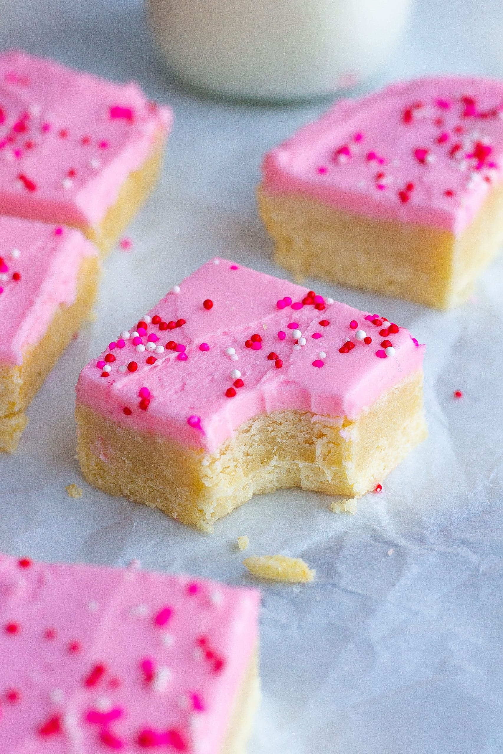 sugar cookie bars with bite mark