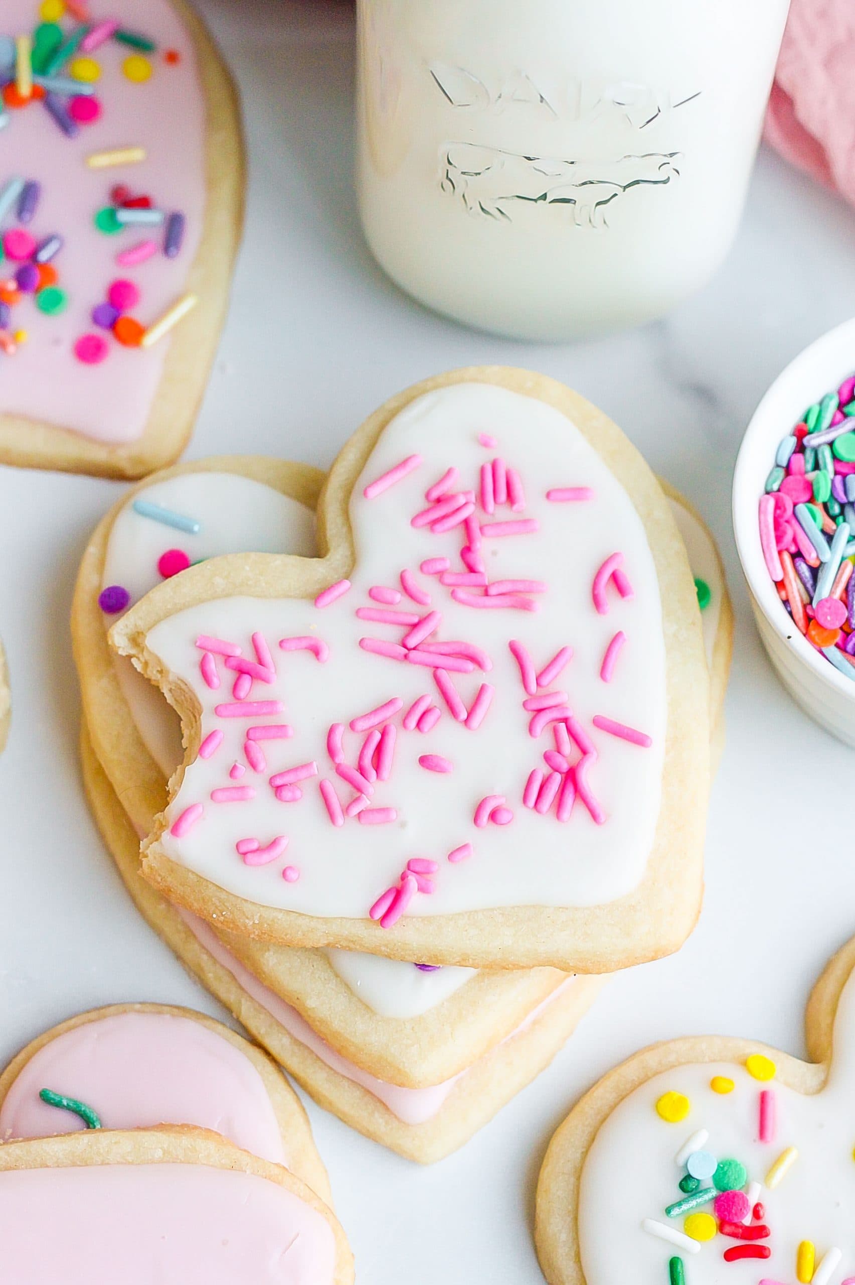 frosted sugar cookies with sprinkles 