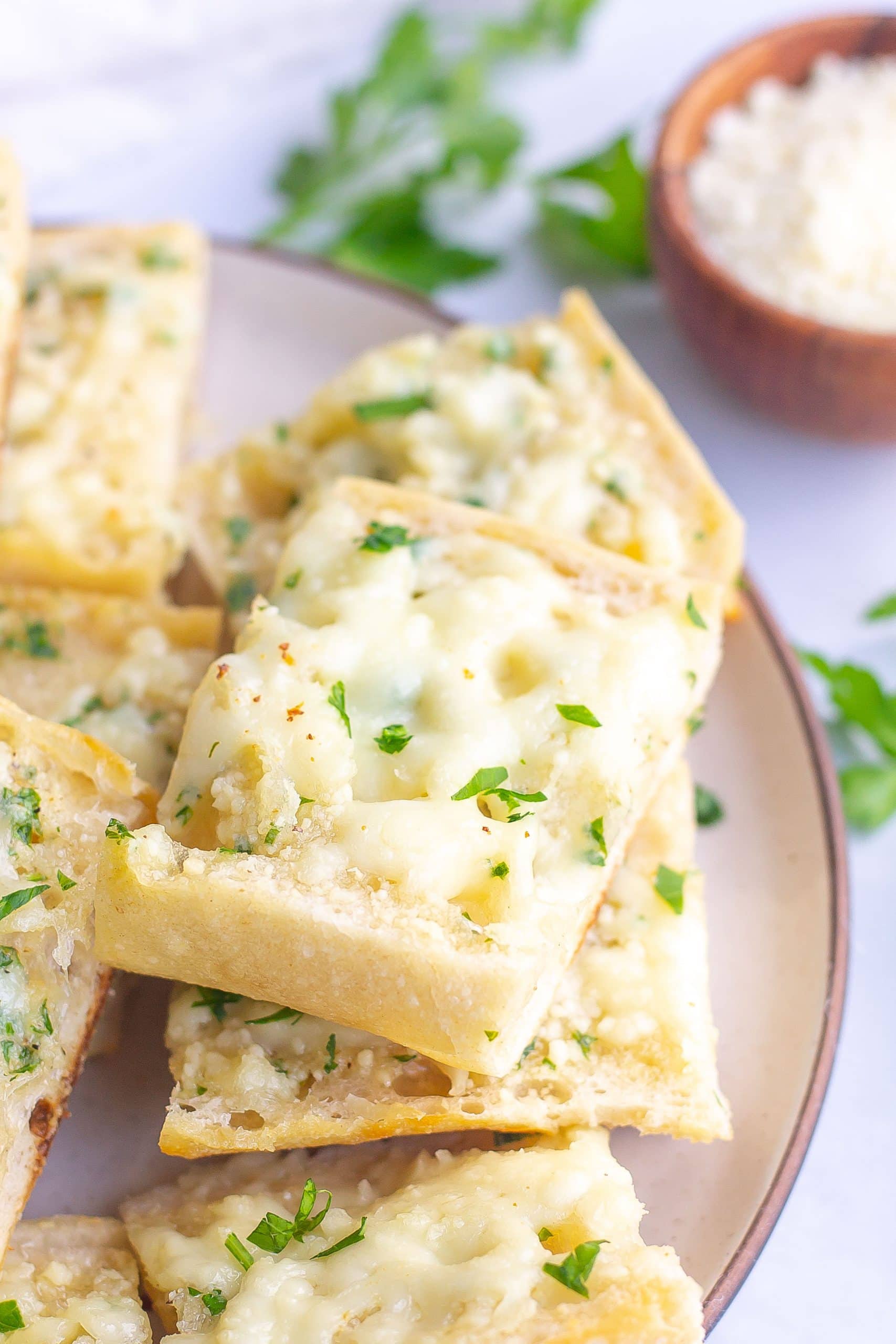 close up of garlic bread with cheese