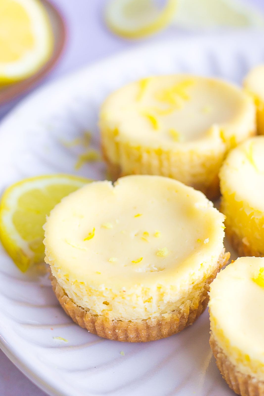 lemon cheesecakes with lemon zest 