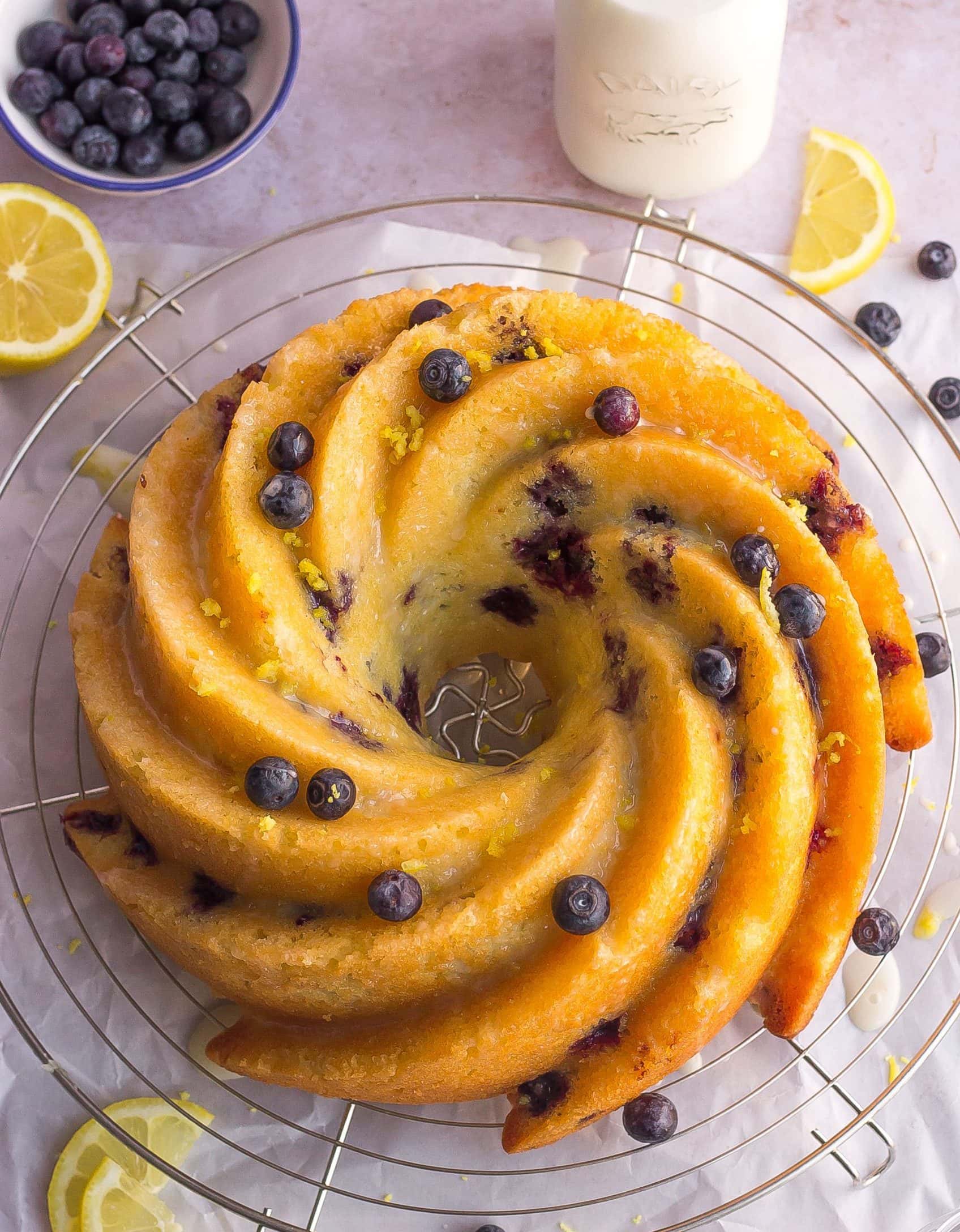lemon blueberry bundt cake on cooling rake