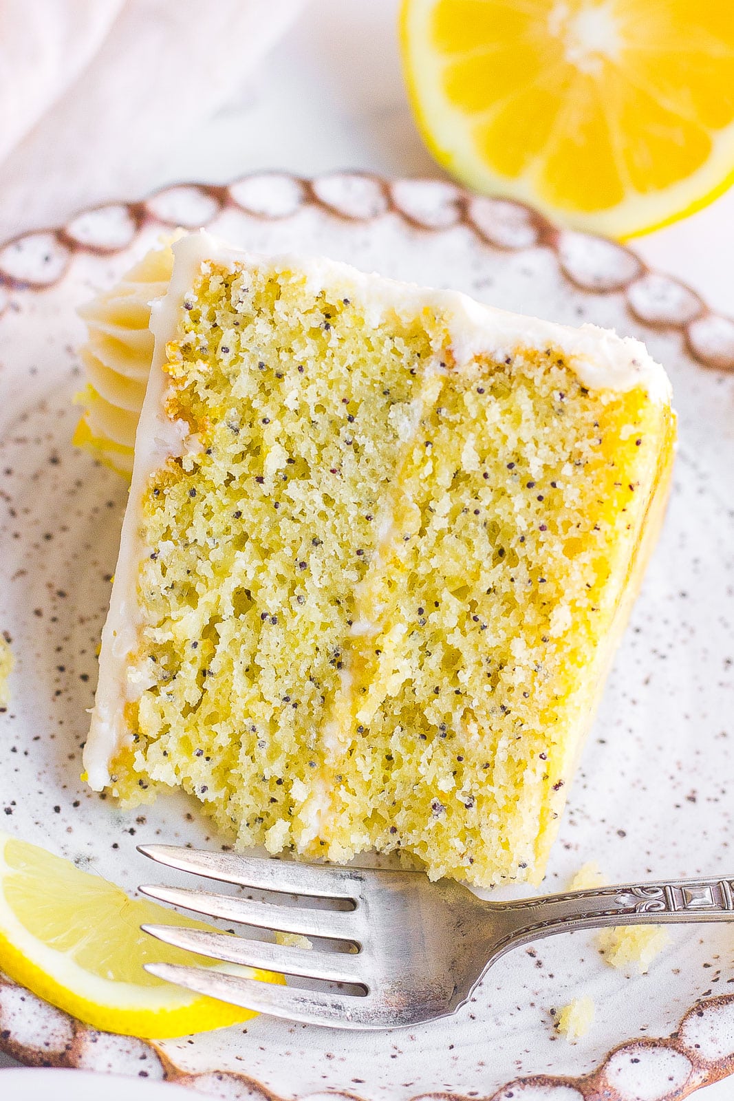 lemon poppy seed cake on serving dish