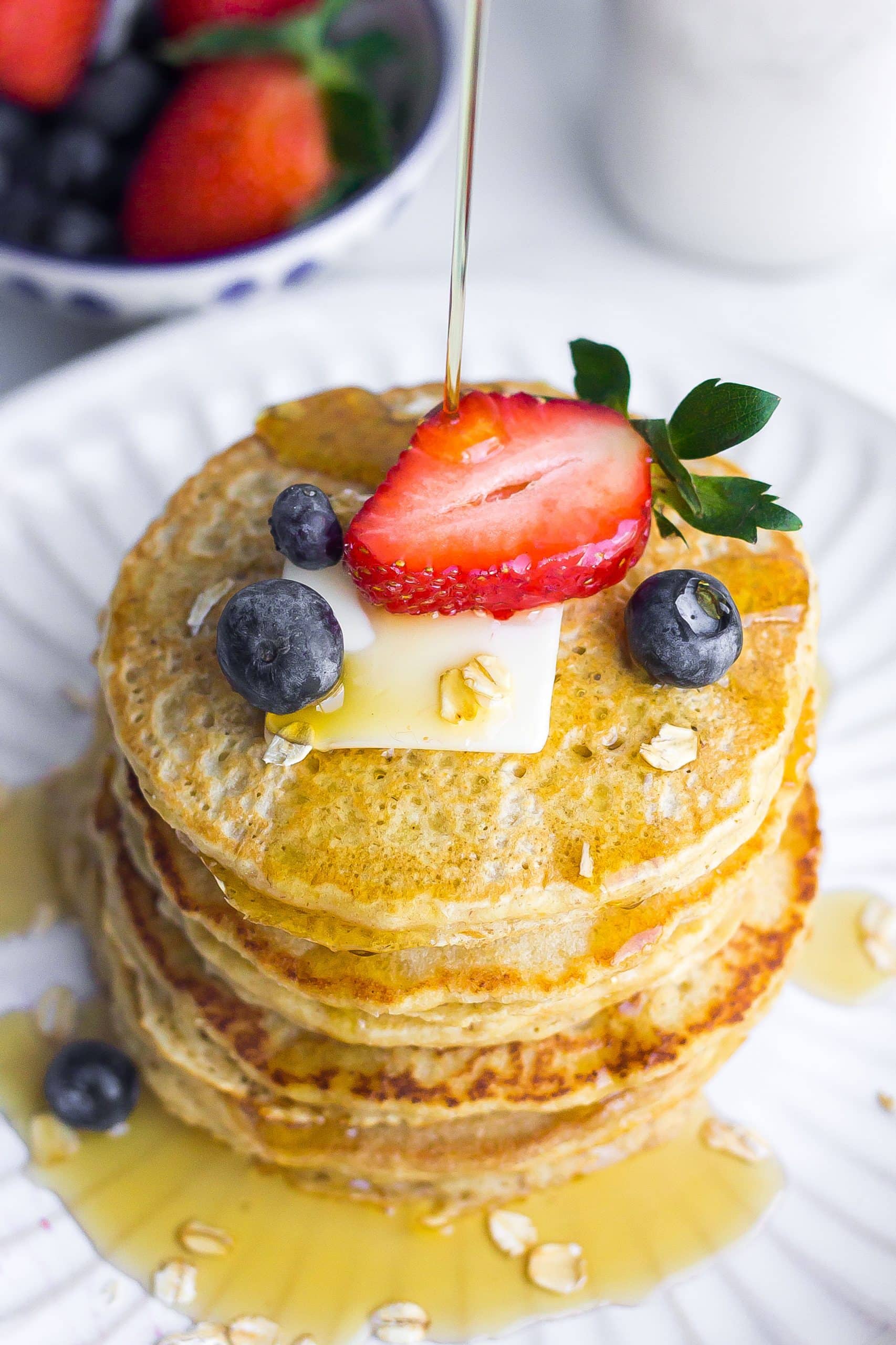 the best oatmeal pancake recipe with a drizzle of maple syrup