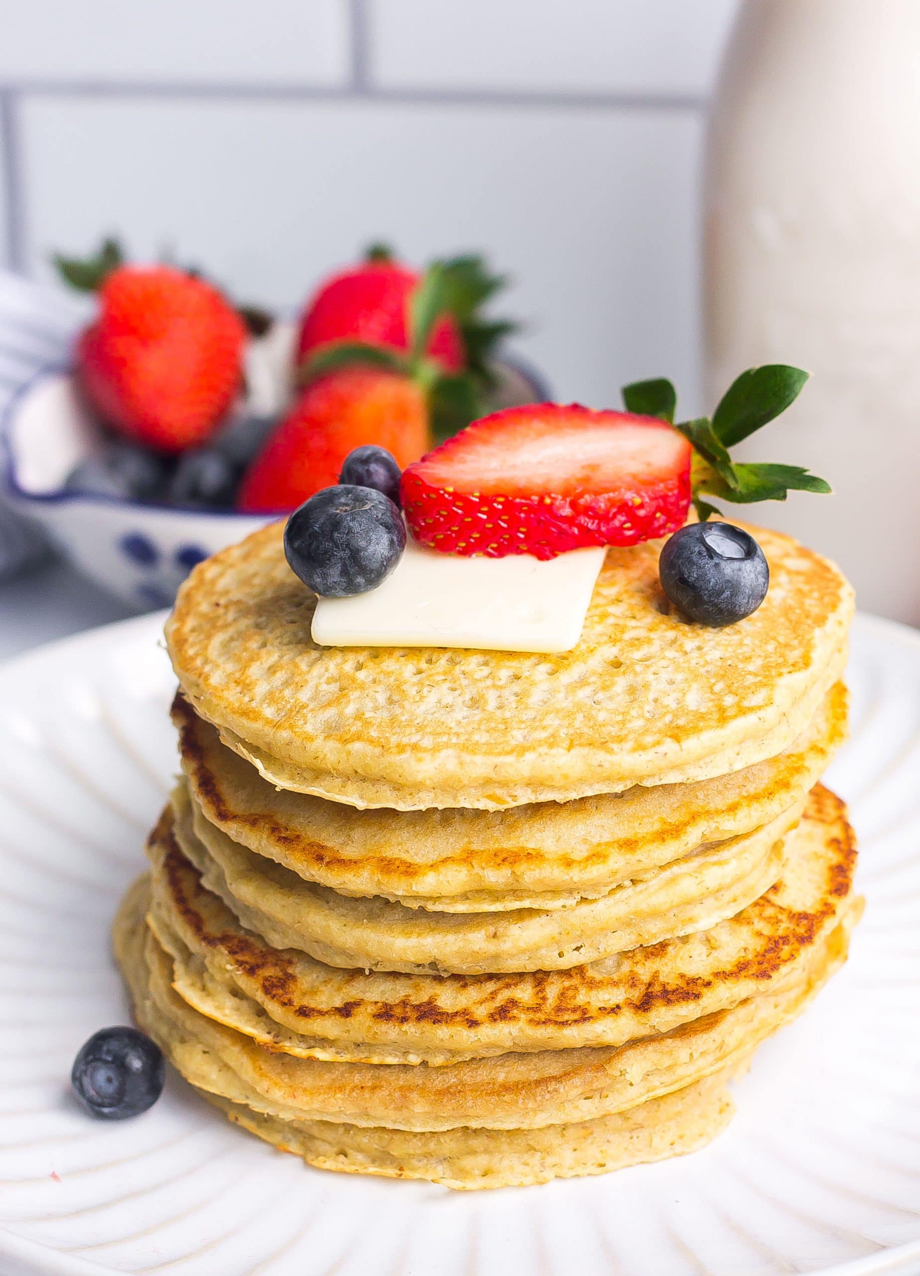 the best oatmeal pancake recipe with berries and butter on top 