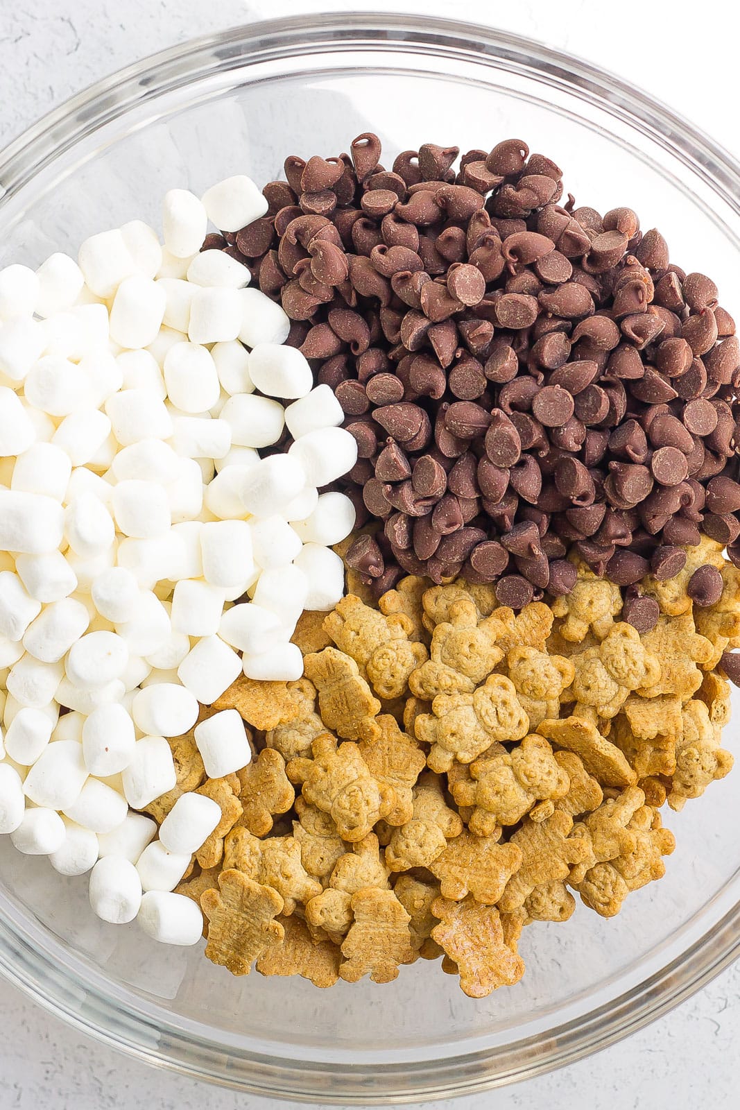 s'mores snack mix ingredients in a large bowl