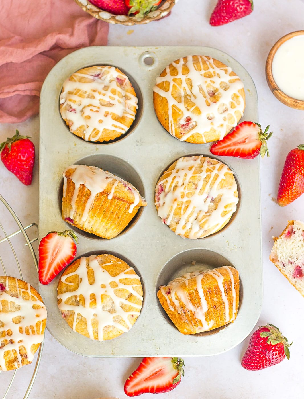 strawberry muffins in muffin pan