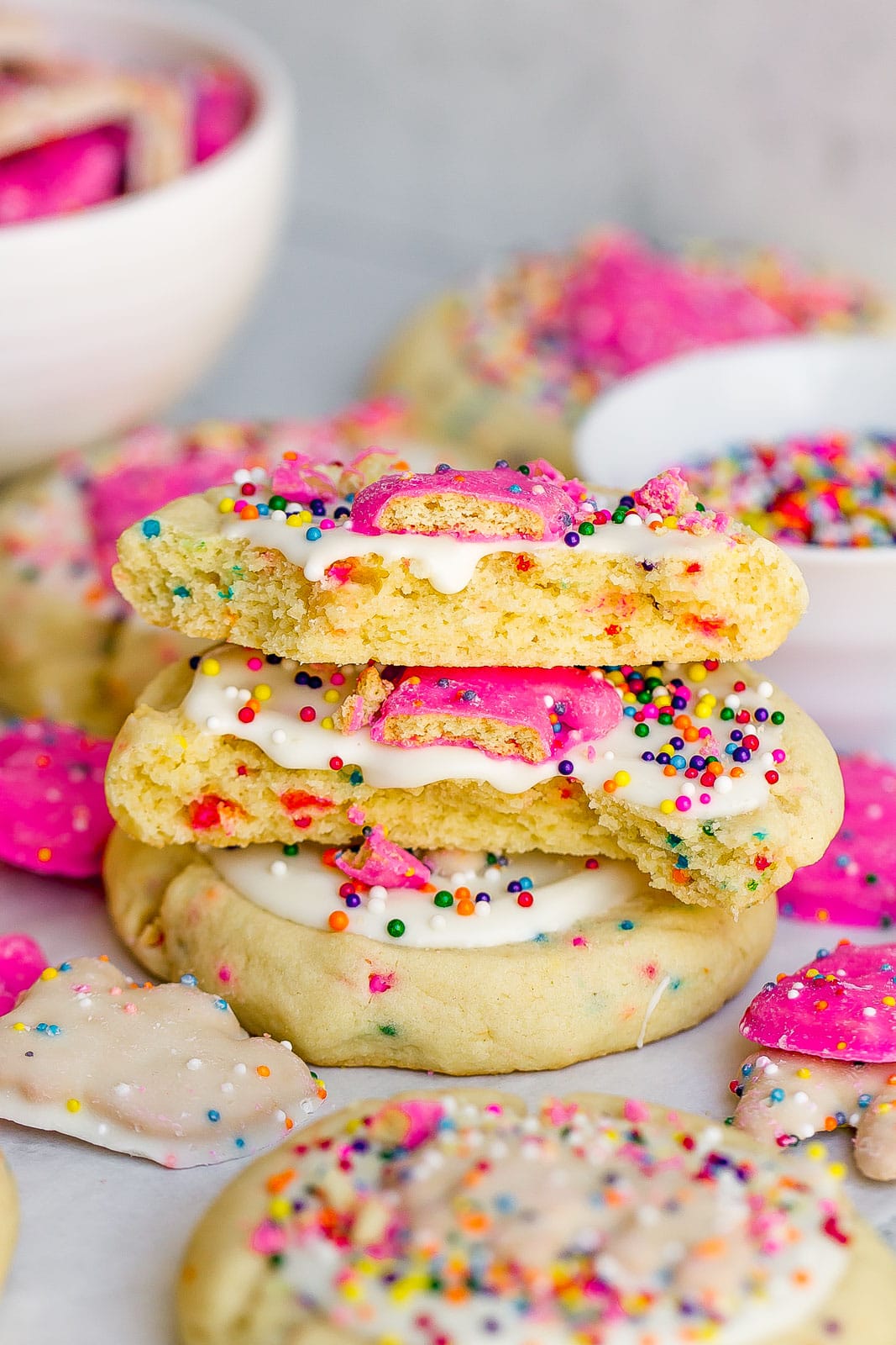 center view of sugar cookies with sprinkles, white chocolate frosting, and circus cookies. 