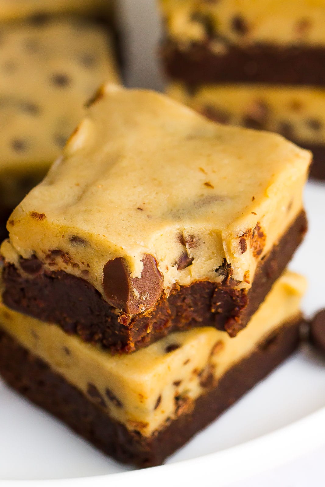 Chocolate Chip Cookie Dough Brownies with a bite mark