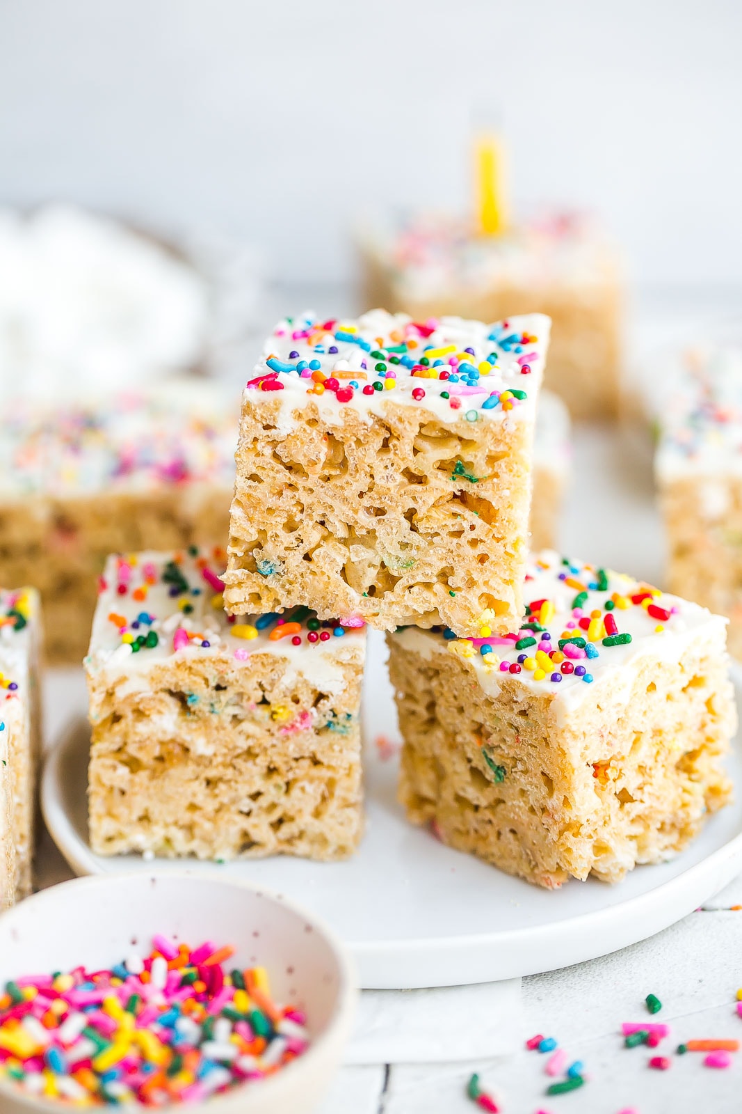 Birthday Cake Rice Krispie Treats on plate with sprinkles on top