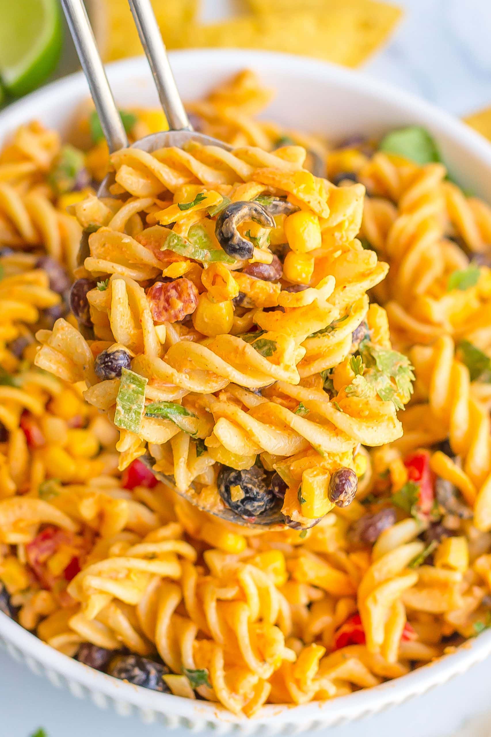 taco pasta salad on a serving spoon