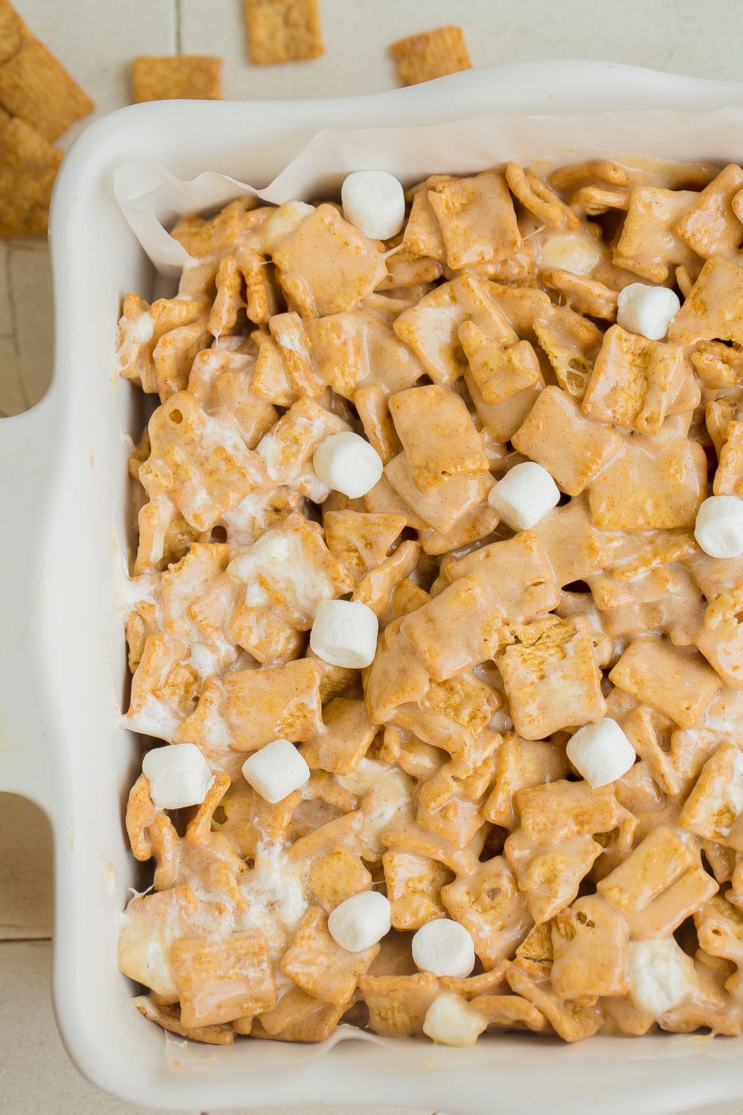 Cinnamon Toast Crunch Cereal Bars in a pan uncut.