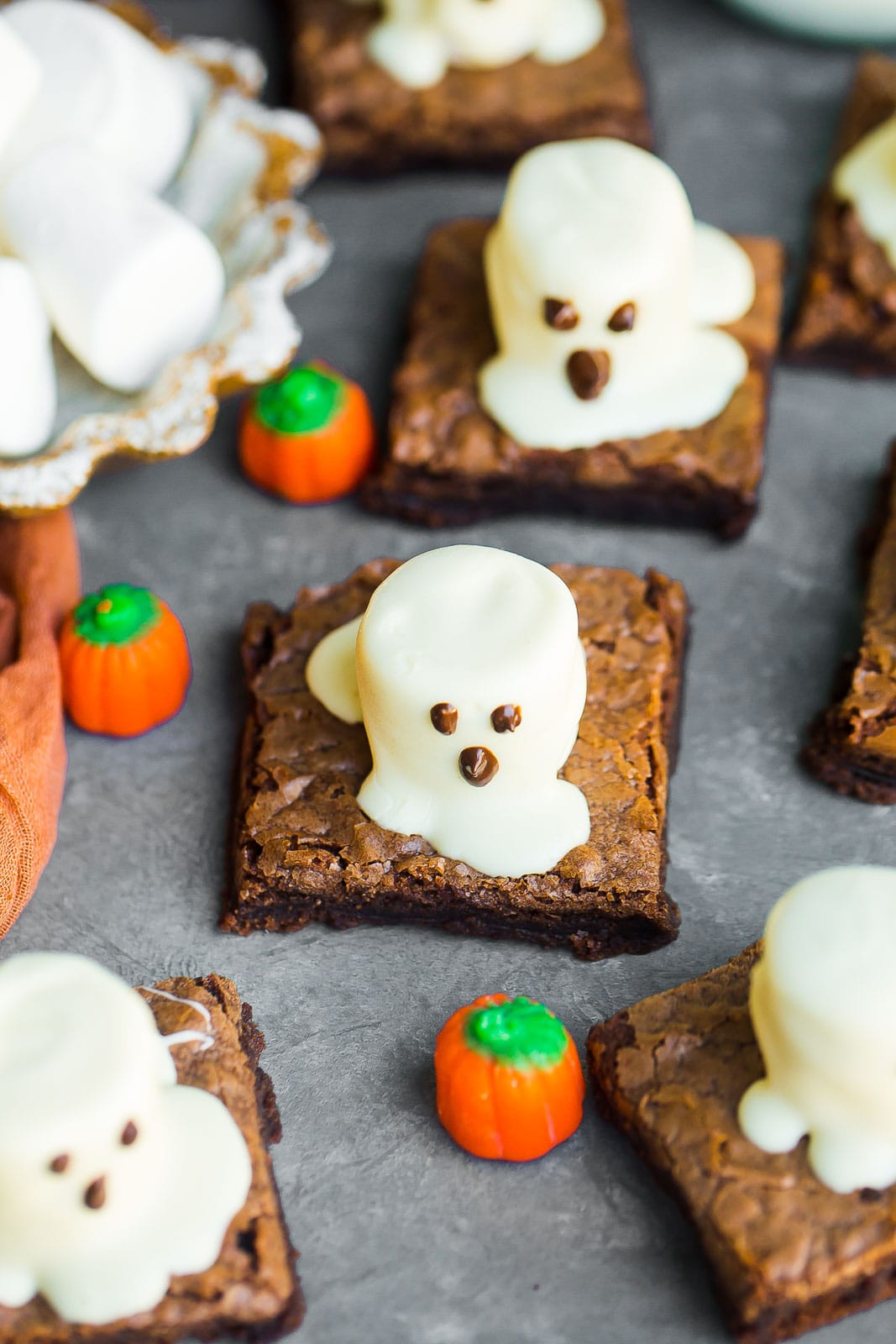 Halloween Ghost Brownies with candy pumpkins.
