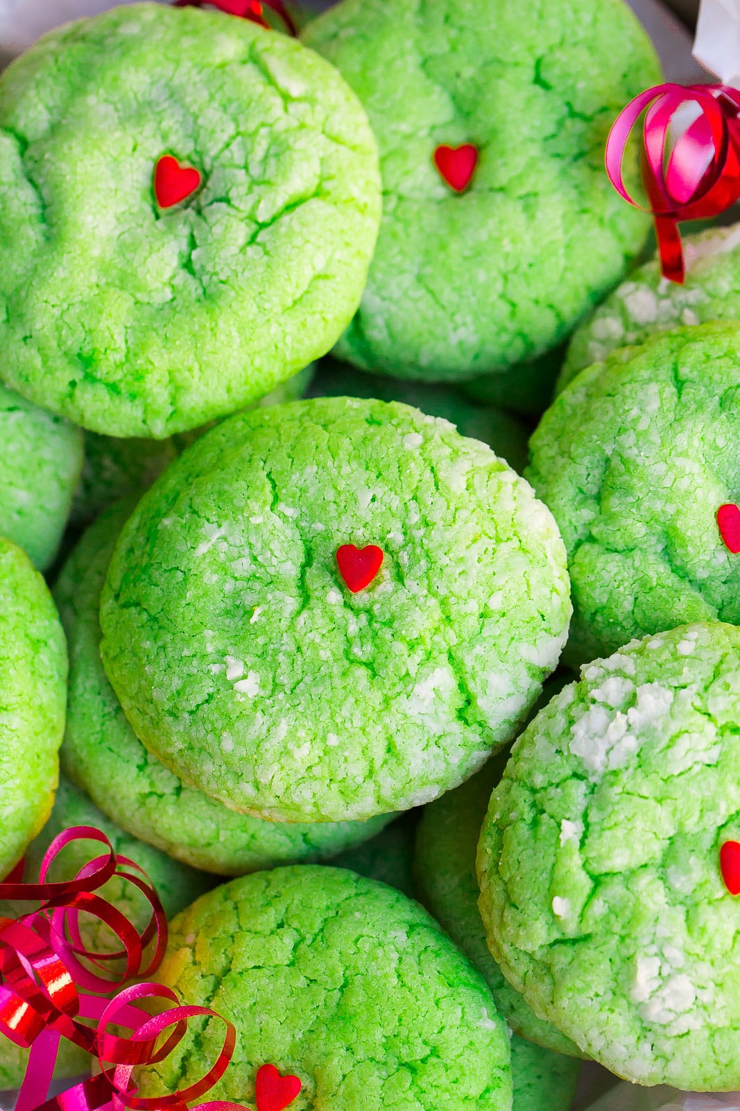 Grinch Cookie recipe with red holiday ribbon.