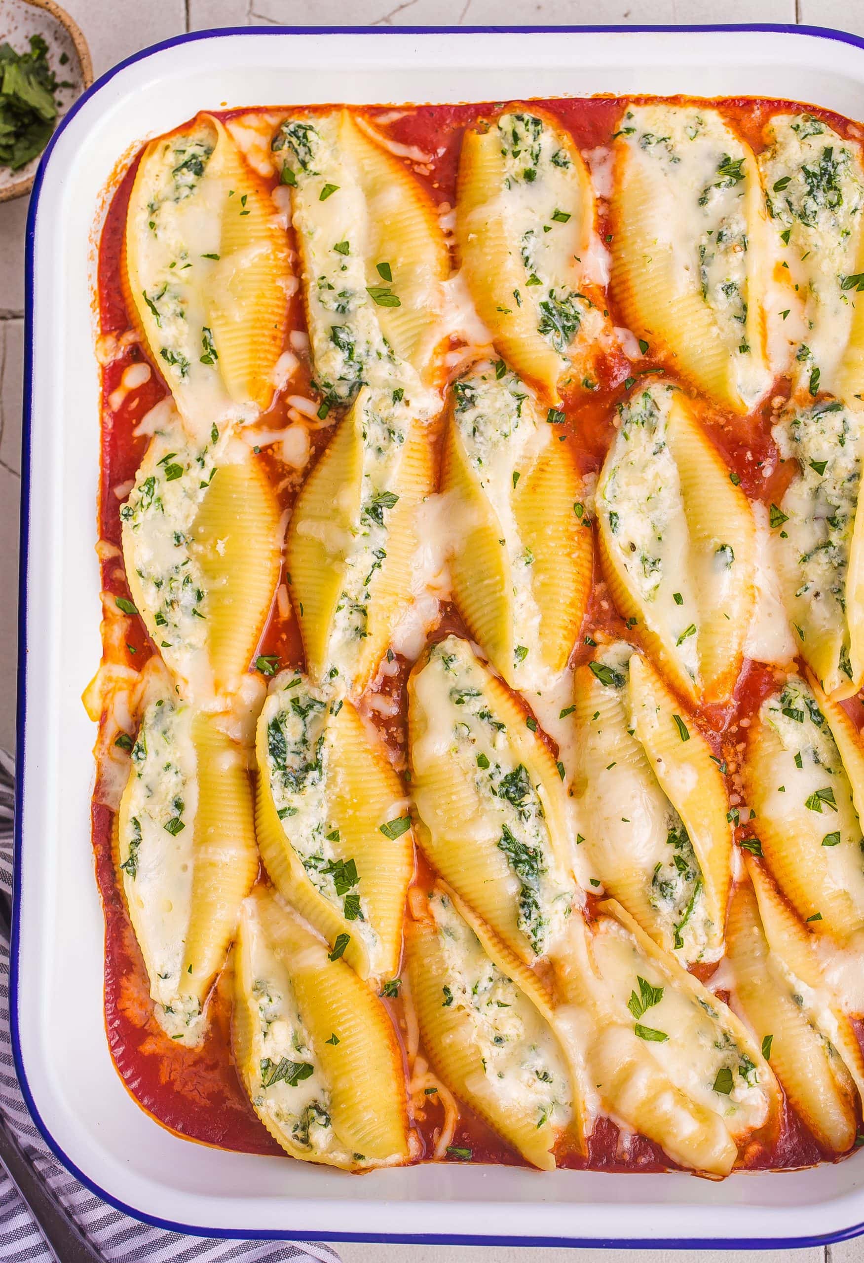 Ricotta and Spinach Stuffed Shells in a casserole dish.