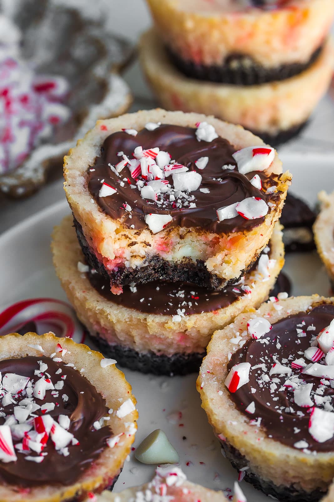 Stack of cheesecake bites with peppermint and chocolate.