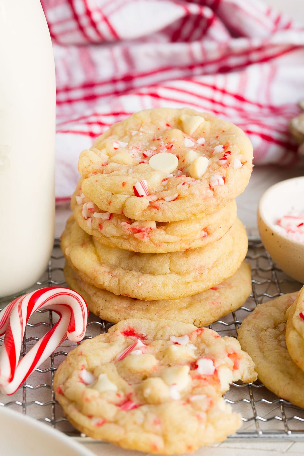 Short stack of peppermint cookies with white chocolate.