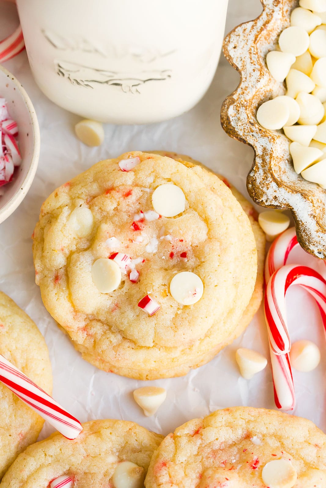 Birds eye view of white chocolate cookie with crushed candy canes.