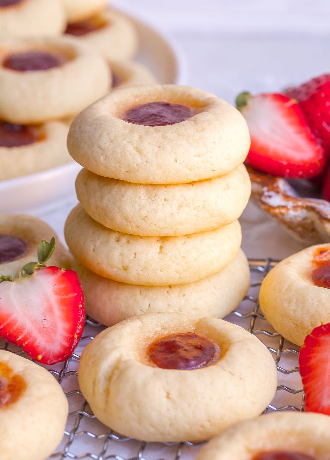 Stack of Strawberry Cream Cheese Cookies on a plate. 