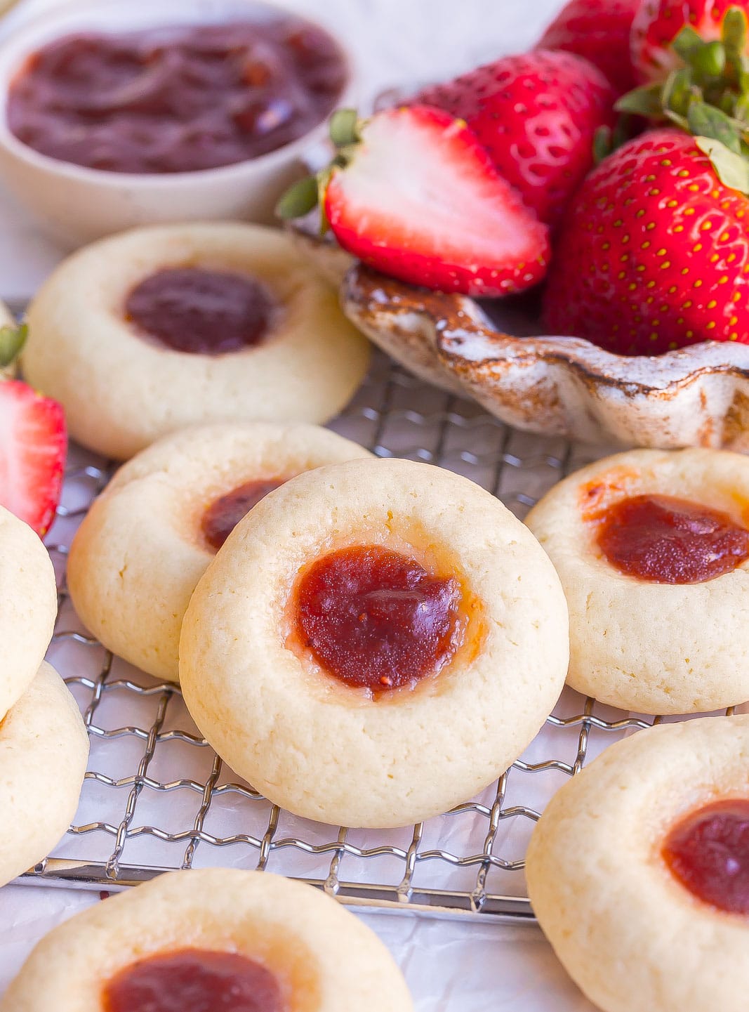 Strawberry Cream Cheese Cookies on a cooling rack.