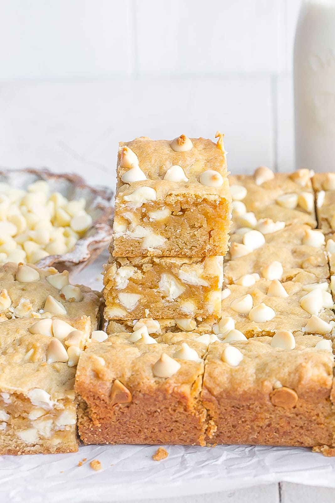 Stack of blondies with white chocolate.