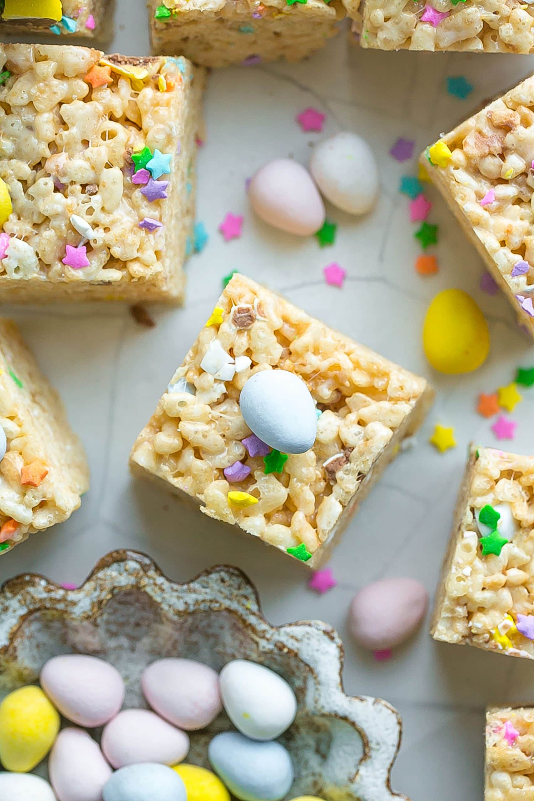 Marshmallow treat with easter candy and pastel sprinkles.