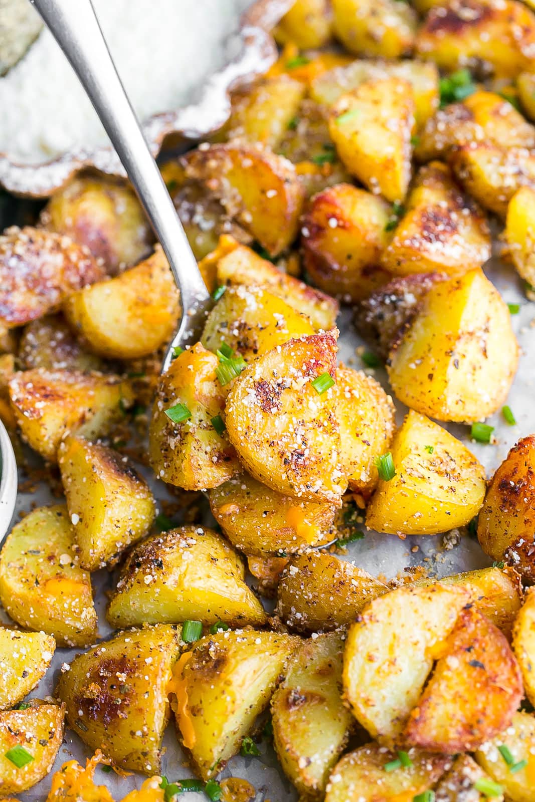 Roasted Potatoes with parmesan and cheddar cheese. 