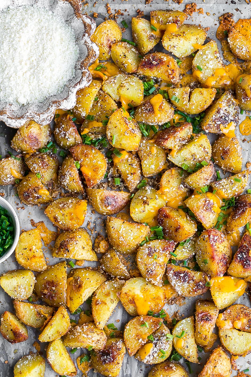 Cheesy Roasted Potatoes on baking sheet. 