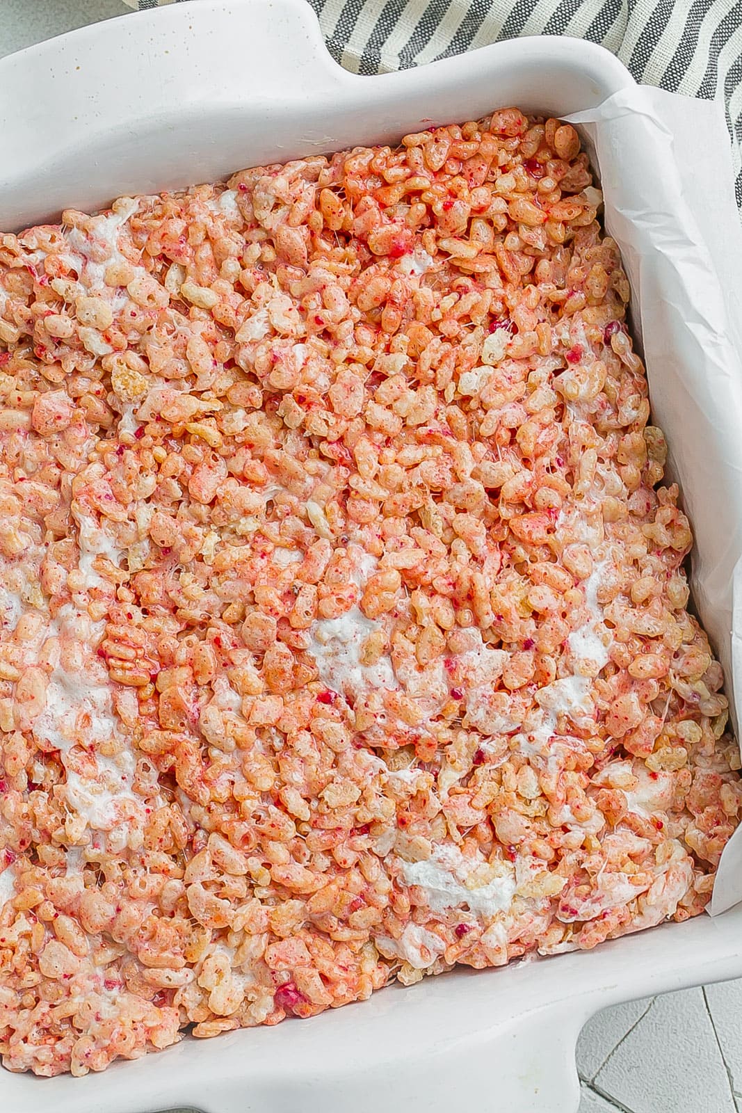Strawberry Rice Krispie Treats in a baking dish. 