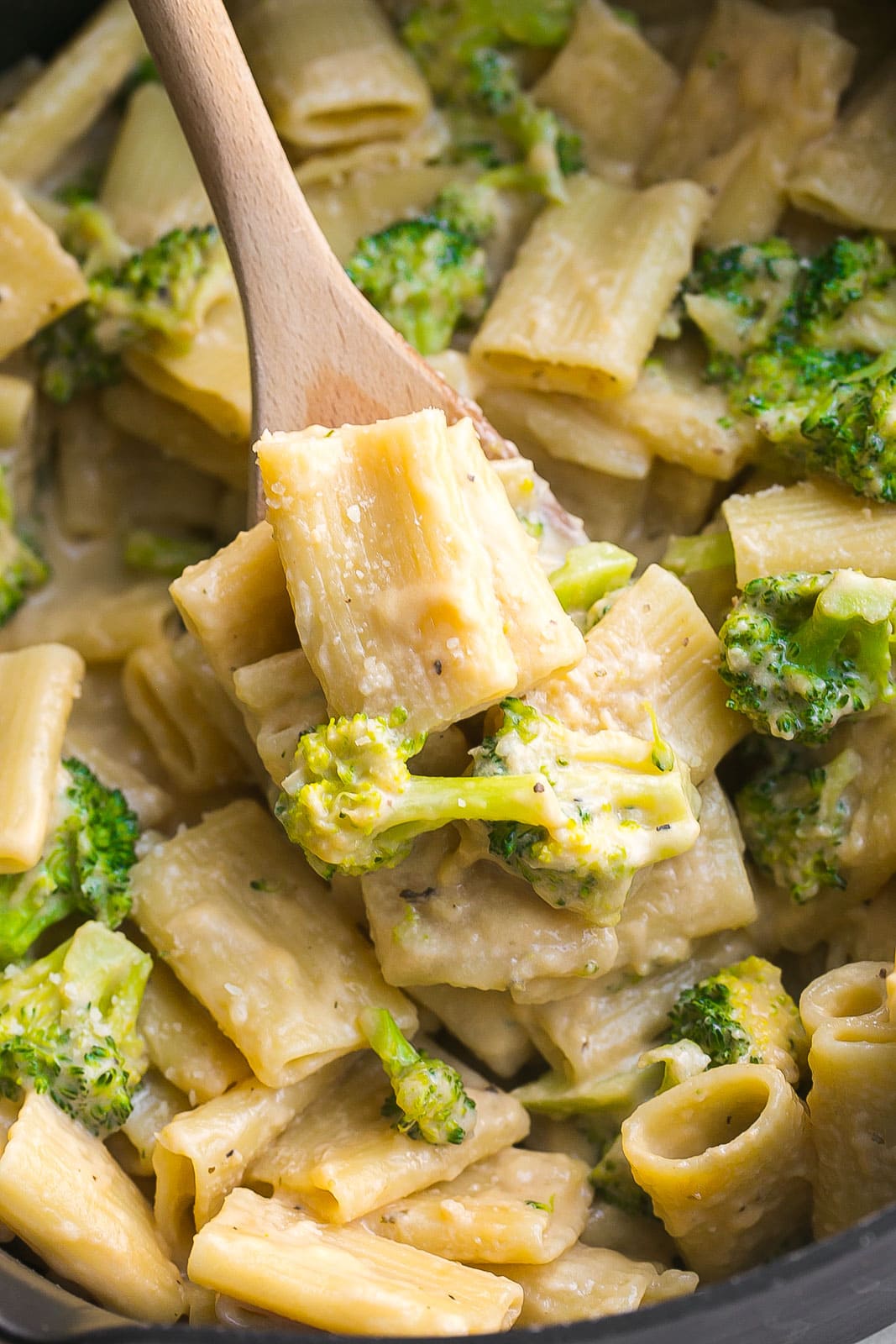 Creamy Broccoli Pasta on a wooden spoon.