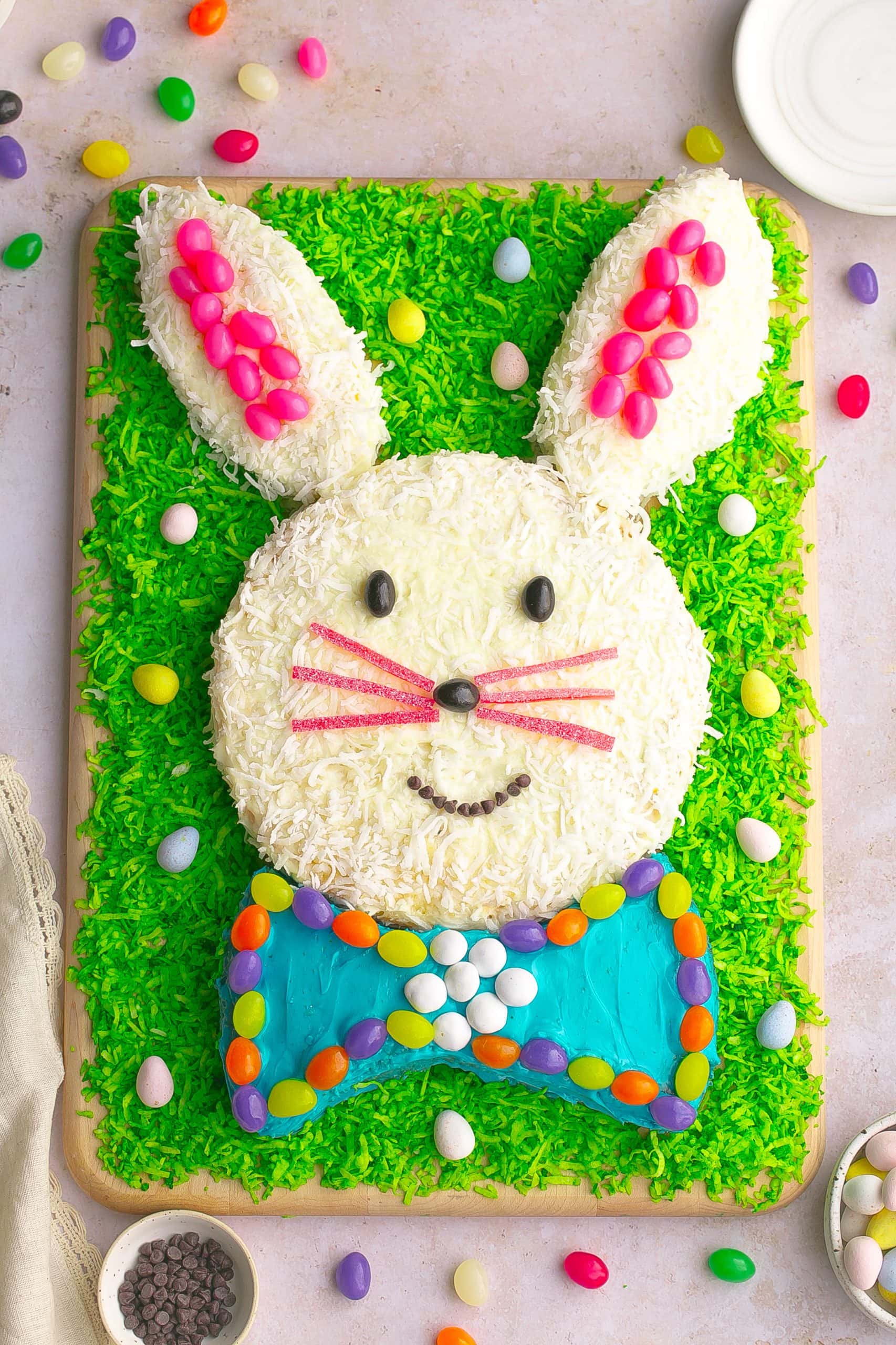 Decorated Easter Bunny Cake with coconut grass and candies.