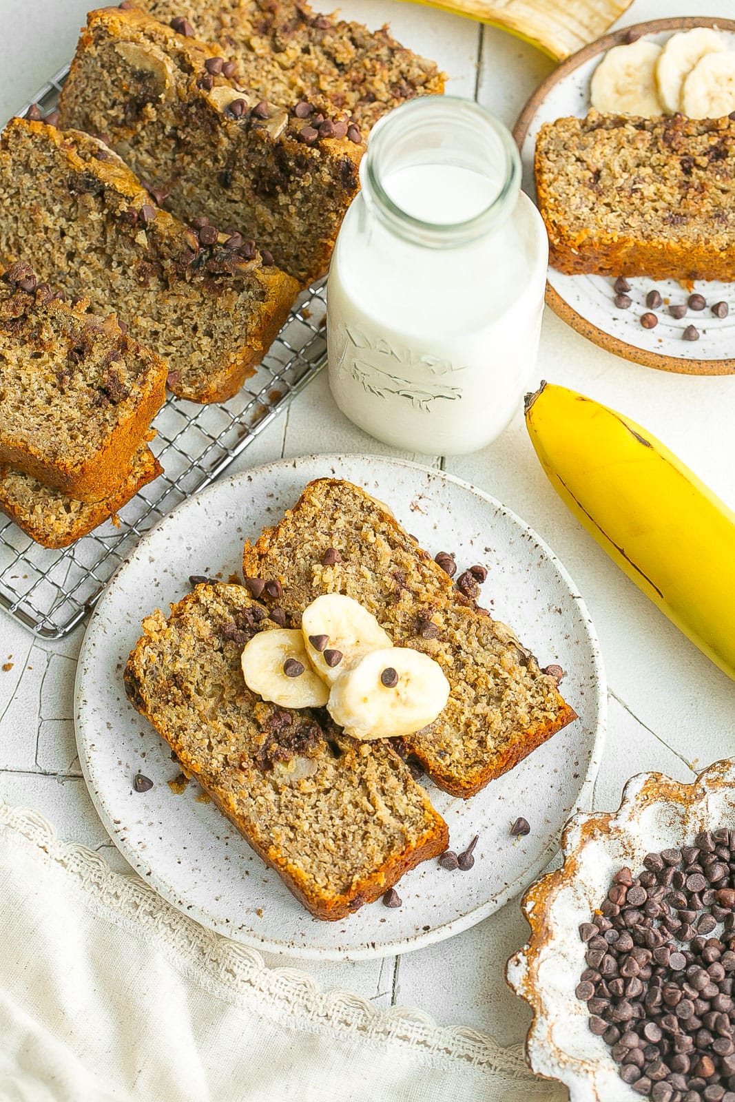 High Protein Banana Bread on plate with milk.