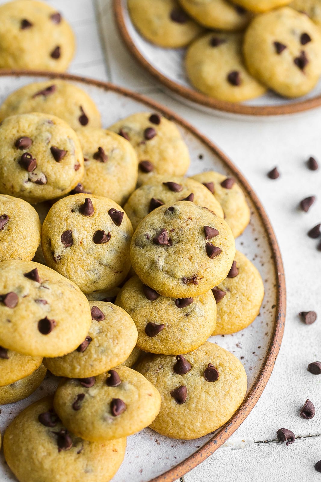 Close up angle view of tiny chocolate chip cookies.