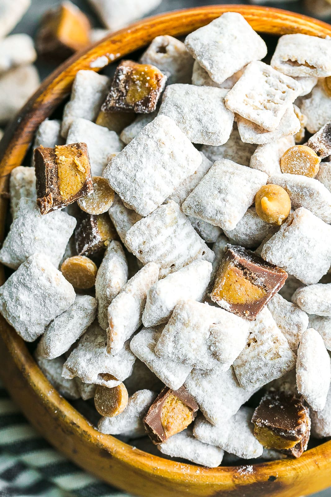 Chex cereal coated with powdered sugar, close up view.