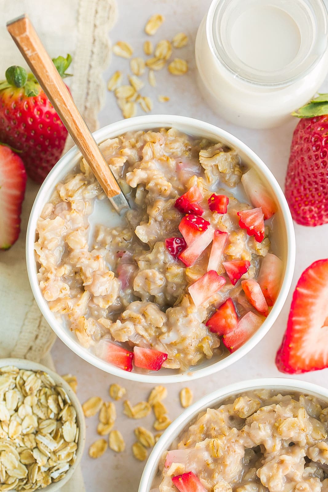 Strawberries and cream oats in a bowl. 